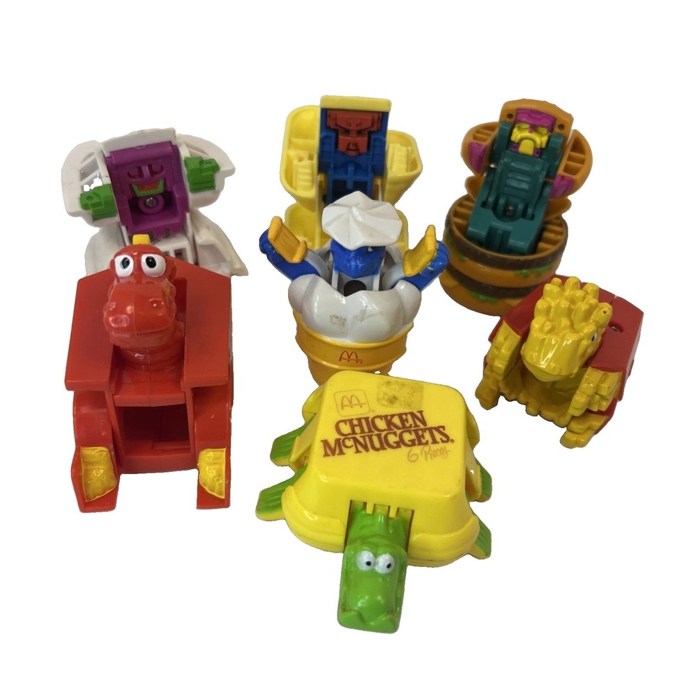 Lot of 7 McDonald's Changeables McDino/Robot Happy Meal Toys Transformers Read
